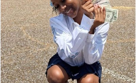 Mother of 1-Year-Old Boy Killed in Controversial Police Shooting Faces Backlash for Flashing Cash at Son’s Funeral